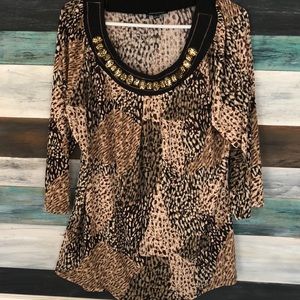 Scooped neck blouse.
